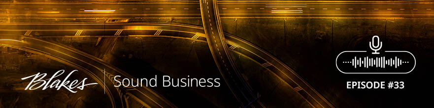 Blakes Sound Business Web Banner, featuring the text 'Sound Business' on a black background with straight and curved highway roads overlapping and lit with golden light